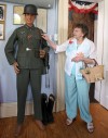 Eunice Slagle Explaining Details of a WW II Uniform Display at Porter County Museum