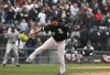 White Sox pitcher Sergio Santos watches a pitch