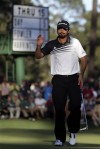 Day leads at Masters; 14-year-old makes cut