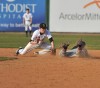 Washington Twp.'s A. J. Whitcomb beats Kouts' Max Everaert's tag
