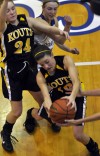 Kouts' Shelby Jones grabs a rebound