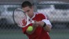 Crown Point's Daniel Smith returns a volley