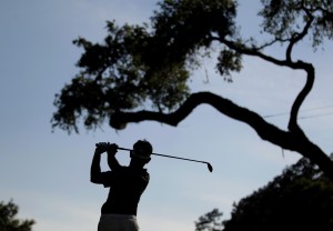 Johnson takes lead as McIlroy heads home