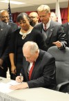 Quinn signs south suburban rail law