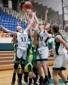 Whiting players jump for a rebound