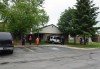 At least one injured after car crashes into brick Gary home