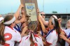 Portage players hold up the Class 4A state championship trophy Saturday night after defeating Franklin Central 2-0.