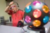 Jerry Stein Prepares Music and Lighting Mood for his Indoor Cycling Class