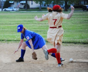 Women don classic baseball teams' uniforms in tribute to WWII-era games