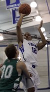 Lake Central's Joe Bannister shoots over Valparaiso's Zach Meyer