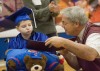 Hundreds turn out to celebrate early graduation of cancer patient
