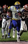Laquon Treadwell gains yardage against Springfield