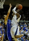 Bishop Nolls's Adonis Filer shoots over a Tipton defender
