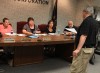 Ousted teacher vows to have his day in court