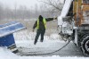 Snow plows work to clear the snow