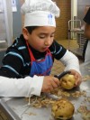 Peeling potatoes