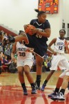 Michigan City senior guard Jameka Collins rebounds