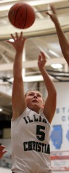 Illiana Christian's Jessica Groen shoots over a Washington defender