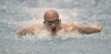 Munster's Dillion Thompson swims the butterfly portion