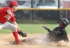 T.F. North's Mikyl Fleming is called safe at second