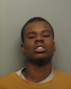 Teen charged in robbery, second suspect at large