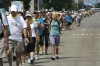 Pilgrims trek through rain for religious journey