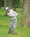 Lake Central's Ryan Dahlkamp watches at No.18 as his ball rolls onto the green Friday afternoon the Uebele Invitational.