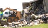 Overturned trash hauler snarls U.S. 30 traffic