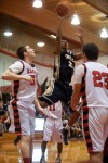 Bishop Noll junior Tyeron Gates, Lake Station senior Joe Donnelly, Kyle Gooch