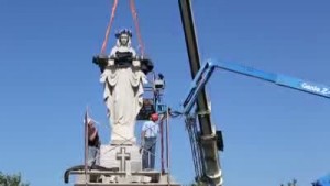 Virgin Mary statue moved to new spot on church grounds
