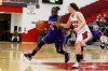 Merrillville's Dariyan Morris, left, drives past Portage sophomore Kaitlin Doud