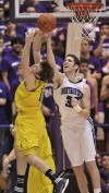 Novak helps No. 11 Michigan beat Northwestern in OT