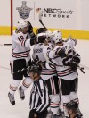 Late-scoring Blackhawks head home with series tied