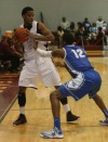 Bowman Academy's Justin King is guarded by Hamilton Southeastern's Zak Irvin