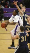 T.F. North senior Deandre Lowery shoots against the defense