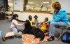 South Holland kids pause to read with four-legged friends
