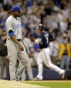 Hart leads Brewers past Cubs in 13 innings