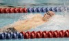 Munster's Dillon Thompson swims the opening backstroke leg