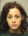 Cops: Woman battered officers, tries to escape