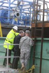 Dredging of E.C. harbor, ship canal delayed by winds