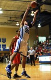 Boone Grove's Jordan Jana grabs a rebound