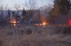 Fire departments work to put out brush fire
