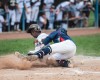 Mount Carmel's Ako Thomas slides in under the tag