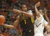 Illinois holds off Iowa