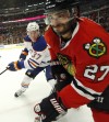 Oduya’s big ‘D’ creates positive domino effect on Hawks