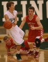 Pursued by Crown Point's Tom Bardeson, Valparaiso's Bret Boetel