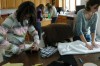 Youths help others in need with sewing project