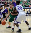Valparaiso's Quentin Palmer drives against Merrillville's Brian Jenkins on Saturday.