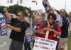 Rallying to keep six-day mail service