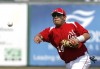 Morton's Jesse Escamilla throws to first